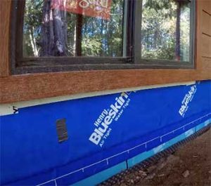 Read more about the article Blueskin VP100 Vs. Tyvek: Unwrapping The Battle of Housewraps
